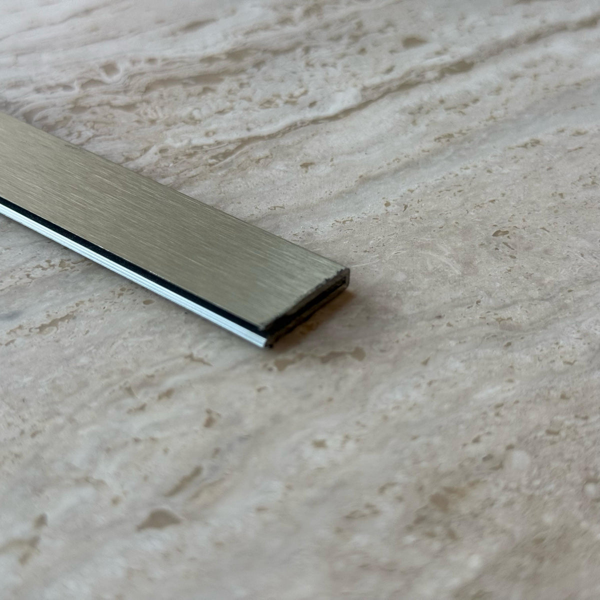 Gold stainless steel U-shape profile wall panel, 0.8mm thickness, 1.8cm wide, by BEACON for modern interior design.
