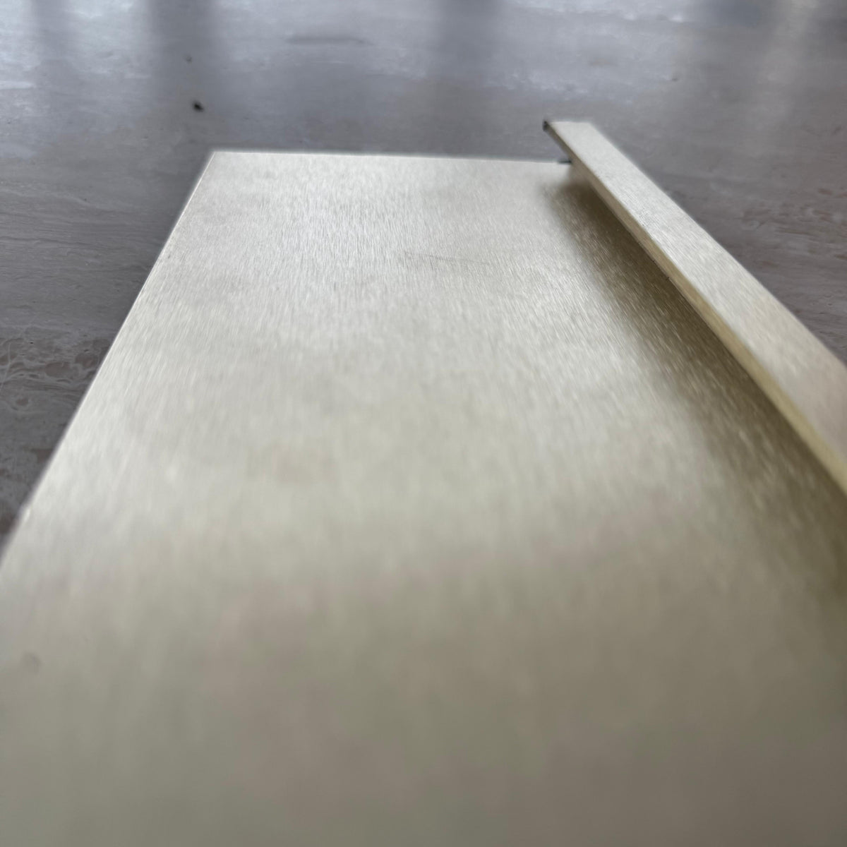 Gold 0.8mm thick skirting profile from BEACON, 10cm wide, designed for wall panels and decorative wall finishes.