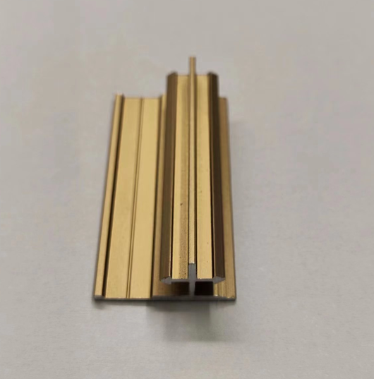Bronze alloy wall panel with 0.8mm thickness and 2.5cm lines shape profile, designed for modern interior decor.