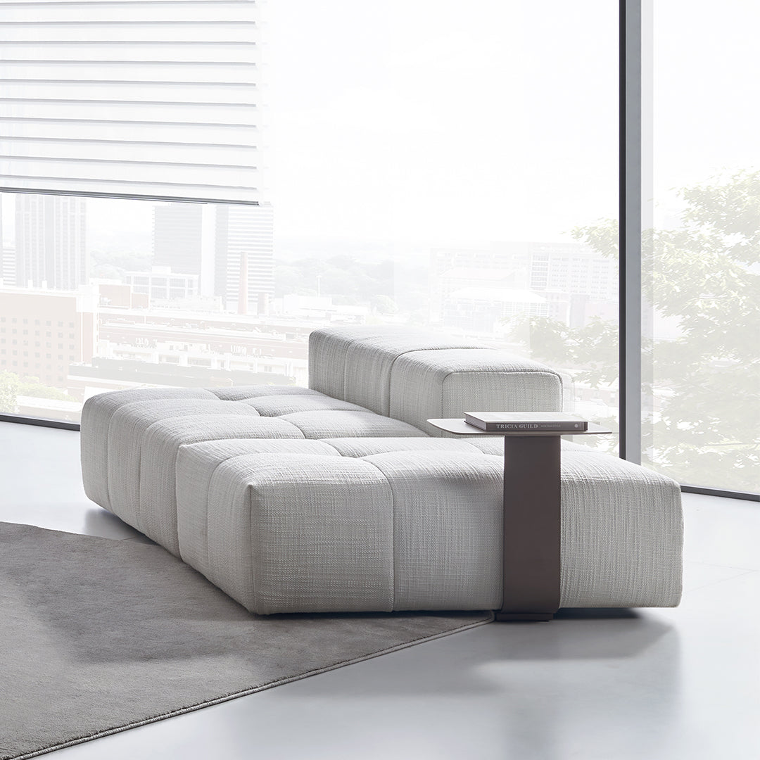 BEACON 120x40 puzzle modular sofa with removable armrest, showcasing flexible seating and modern design in a living room setting.