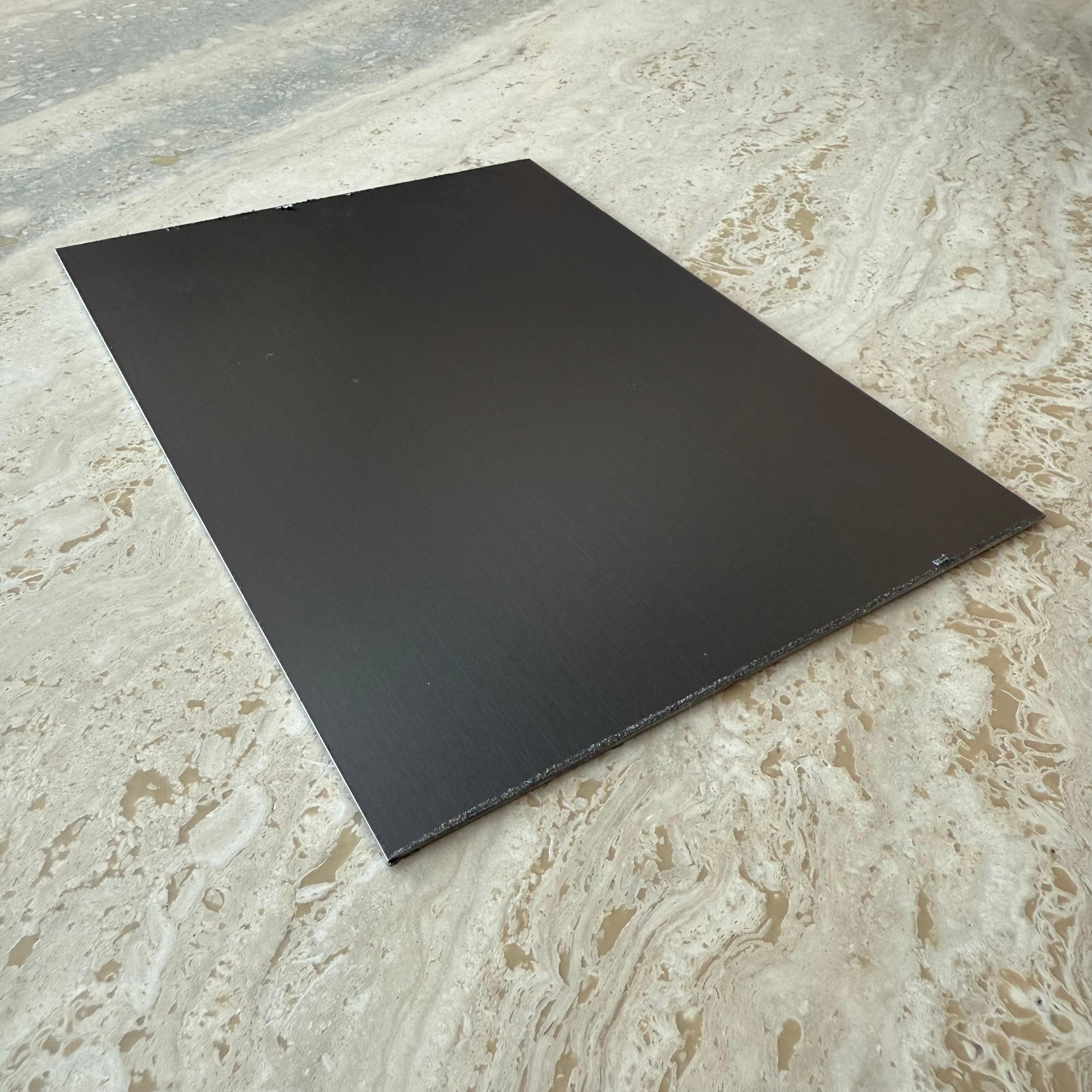 Black stainless steel wall panel profile, 1mm thick, 15cm length, from BEACON, used for wall panels and interior design.