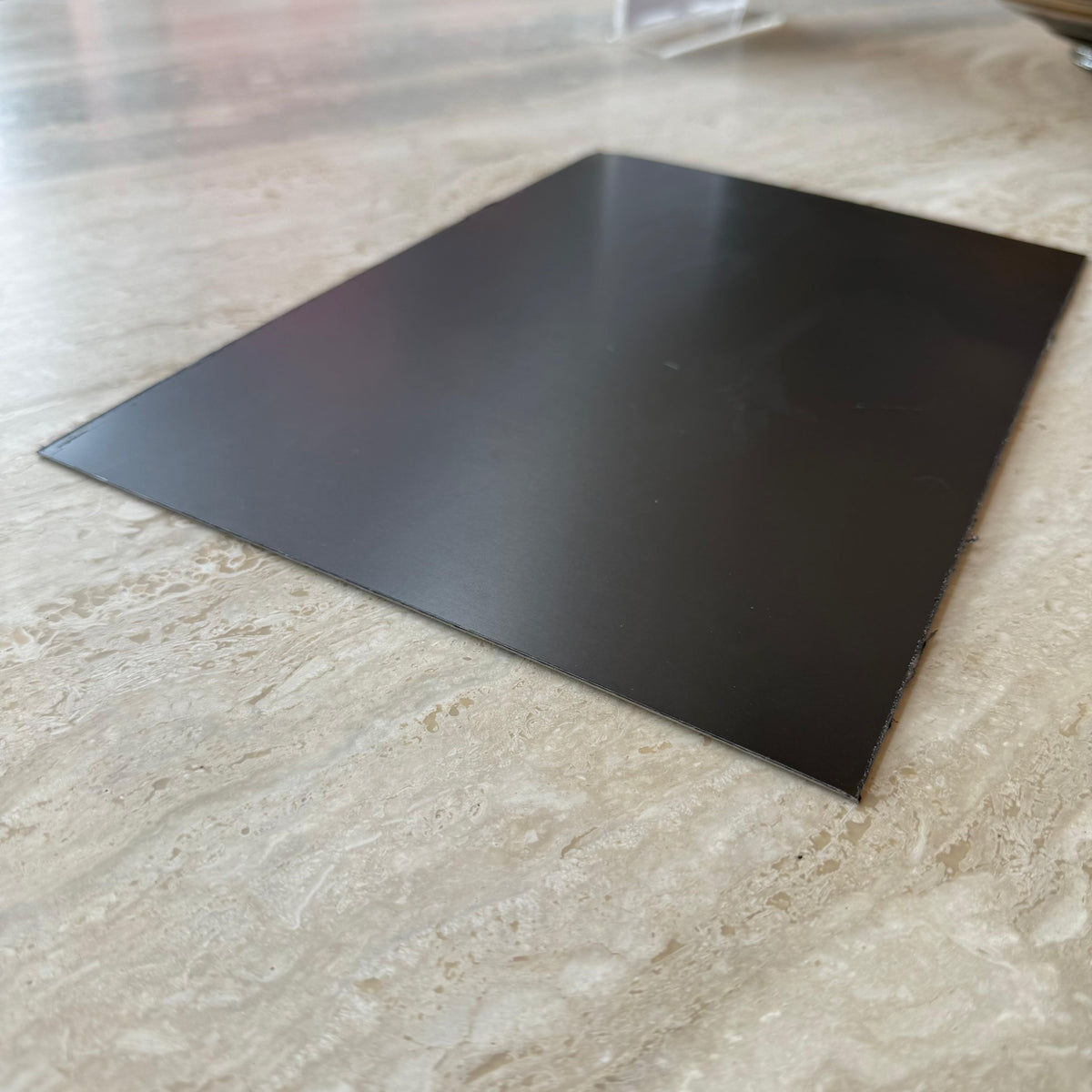 Black stainless steel wall panel profile, 1mm thick, 30cm length, by BEACON, suitable for modern wall paneling and interior design.
