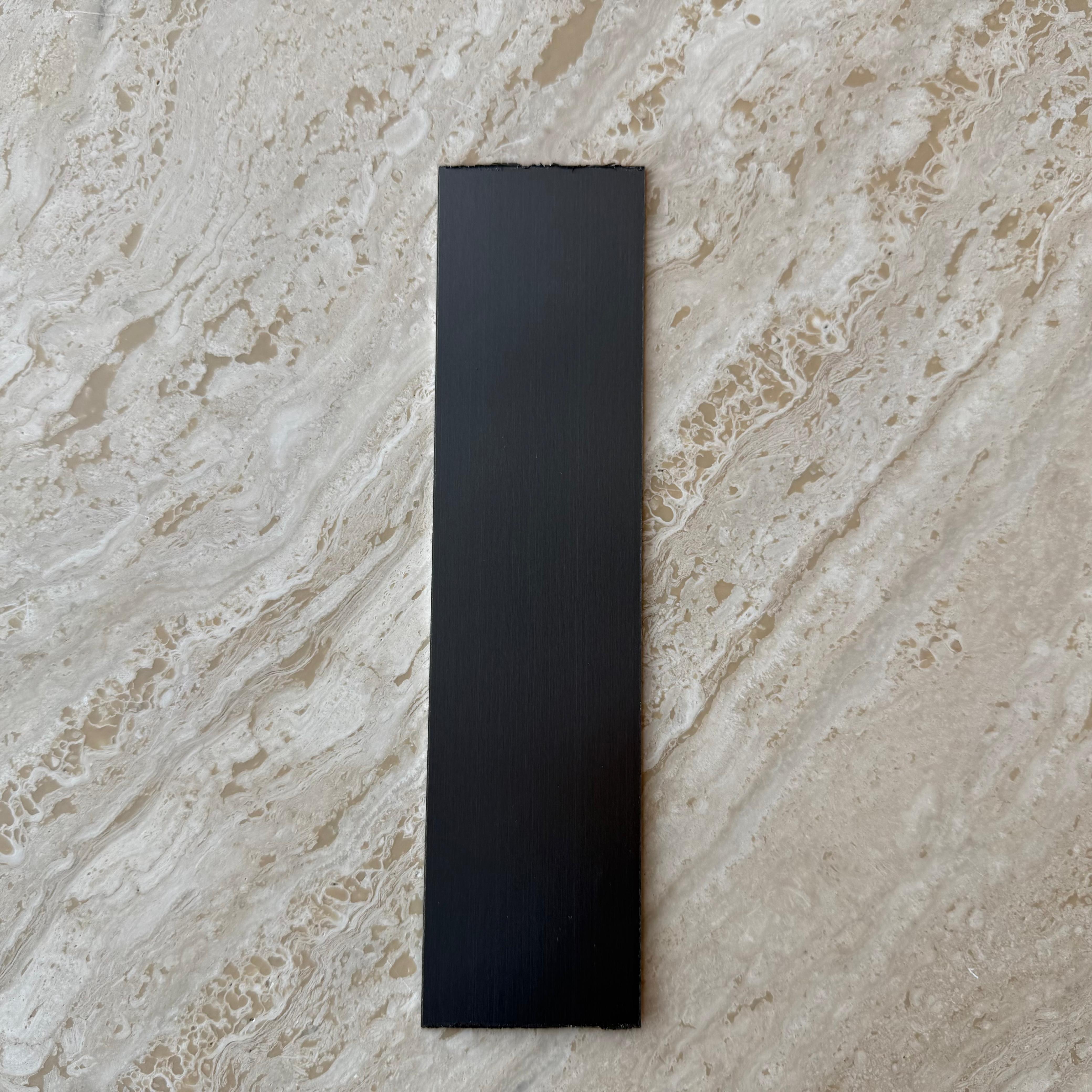 Black stainless steel profile, 1mm thick, 5cm wide wall panel profile by BEACON, ideal for modern interior design.