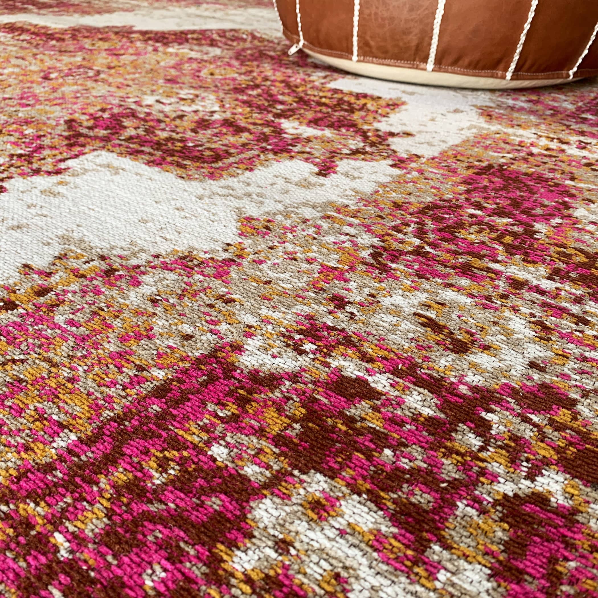 Handmade Melenia rug by Javi in 230x160 cm size, featuring intricate patterns on a soft, woven textile.