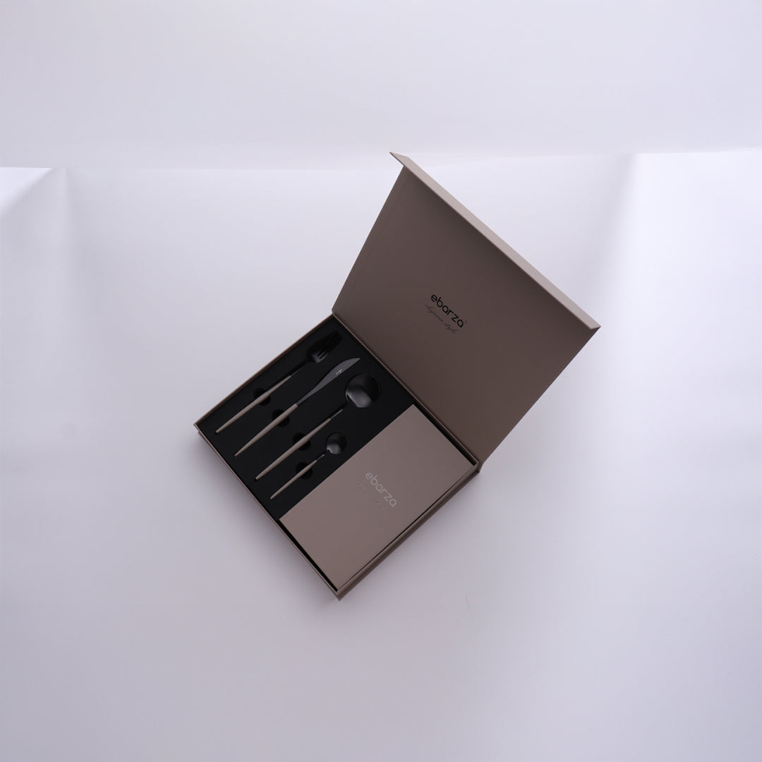 24-piece Glint cutlery set by BEACON with stainless steel forks, knives, and spoons, polished and elegant for dining.