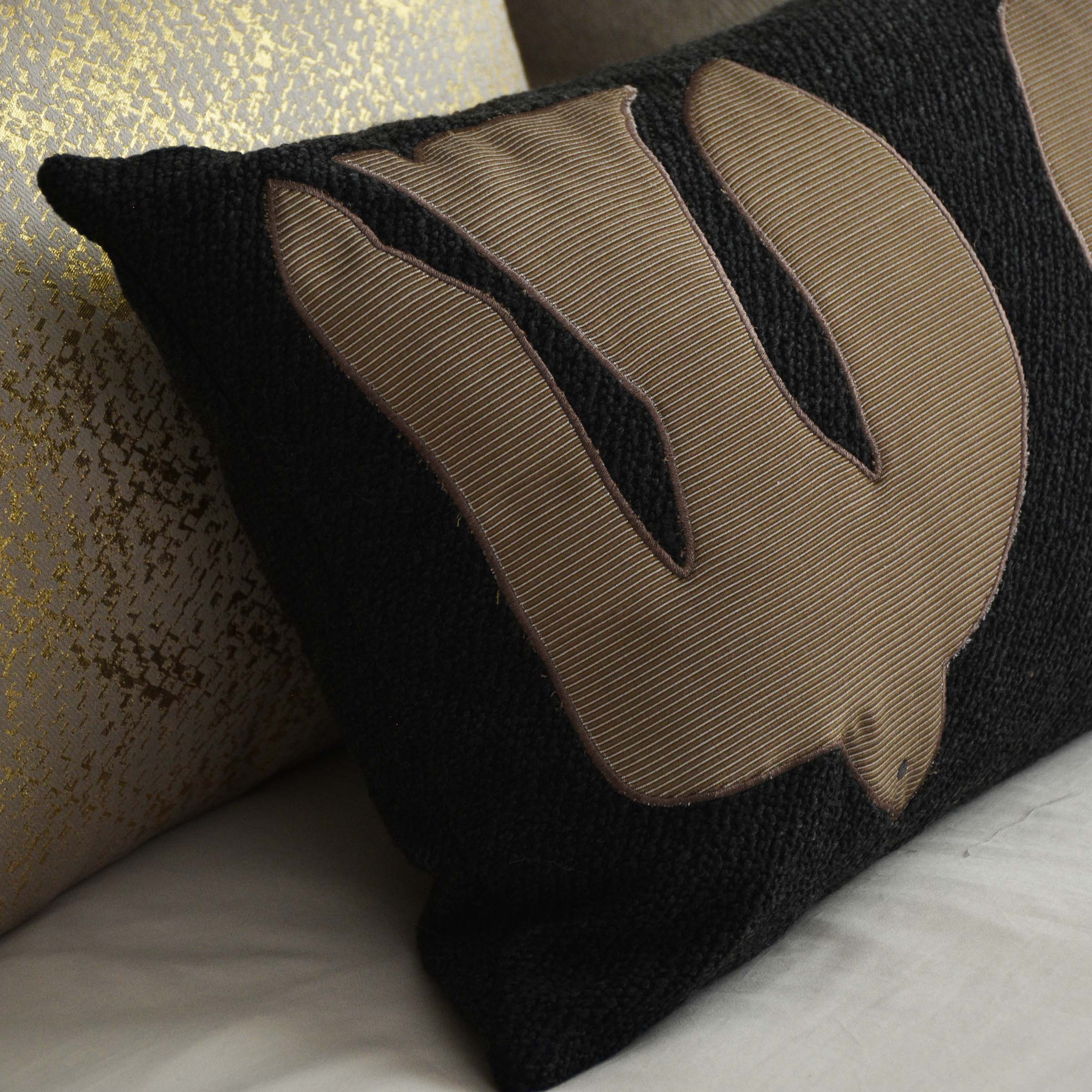 Embroidery cushion with Chastain design from BEACON, 30x60 inches, featuring detailed stitching on soft fabric.