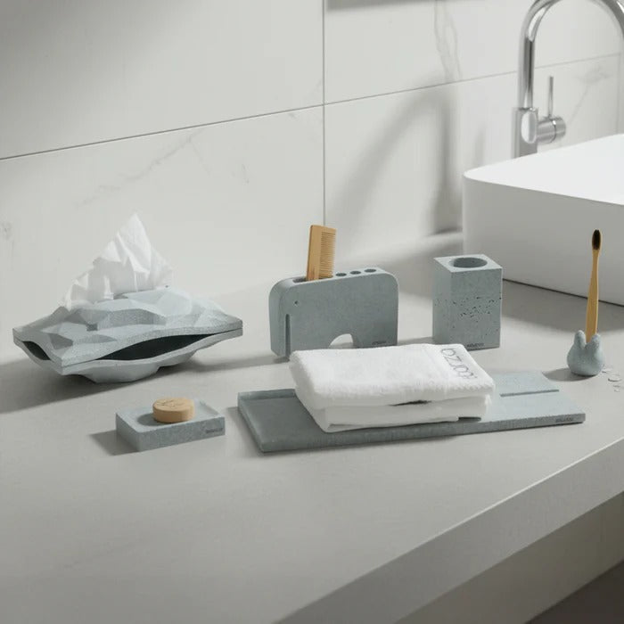 Six-piece SKIVA Ebarza bathroom accessories set by BEACON, includes soap dispenser, toothbrush holder, and other bathroom essentials.