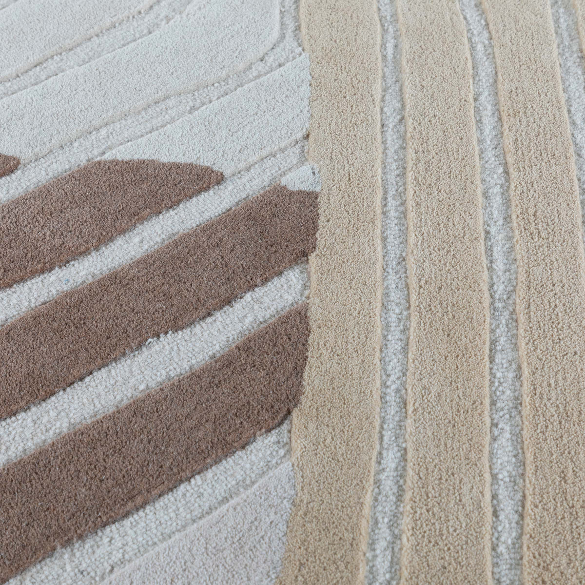 Beige wool rug measuring 600x350 cm from Javi, with soft texture and intricate woven pattern suitable for living rooms or bedrooms.