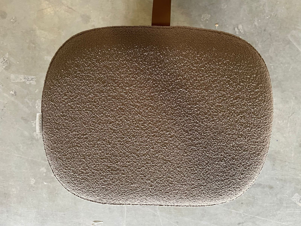 Gray Nomad Fabric and PU pouf display item by Beacon, featuring a soft, textured surface and compact, versatile design.
