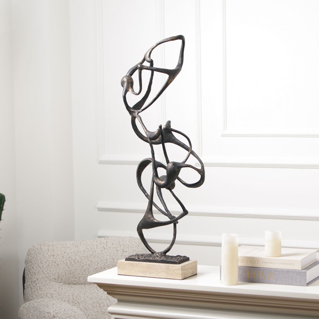 Balanced molecule sculpture by BEACON home decor figurine, featuring interconnected metal spheres in a balanced design.