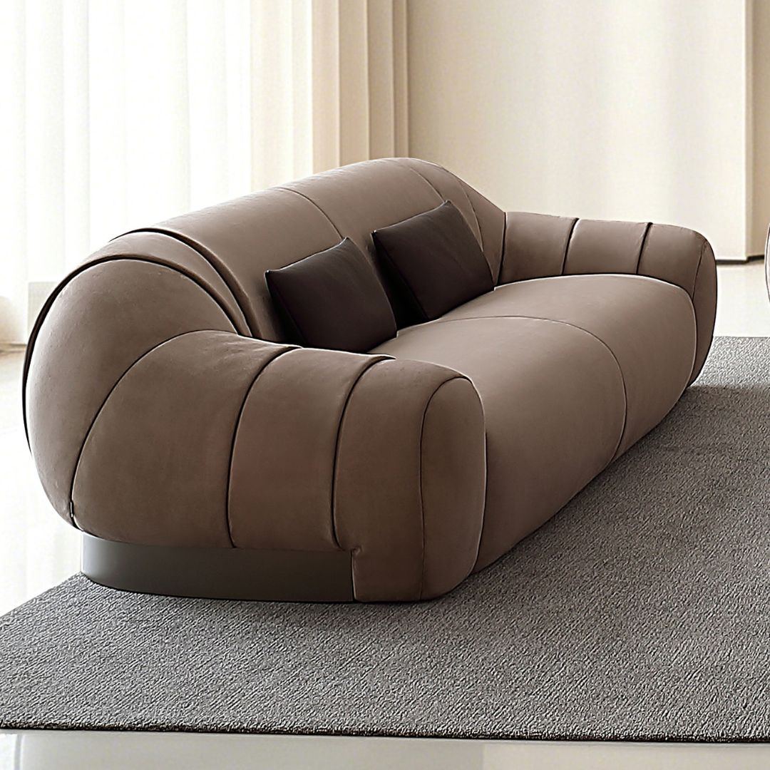 BEACON Blob 3-seater sofa with two pillows, modern design, soft fabric upholstery, and spacious seating.
