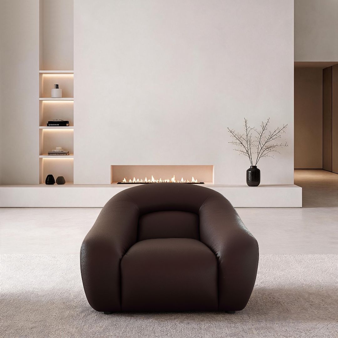 Modern beige blob armchair by BEACON, featuring soft fabric upholstery and a rounded, plush design for comfortable seating.