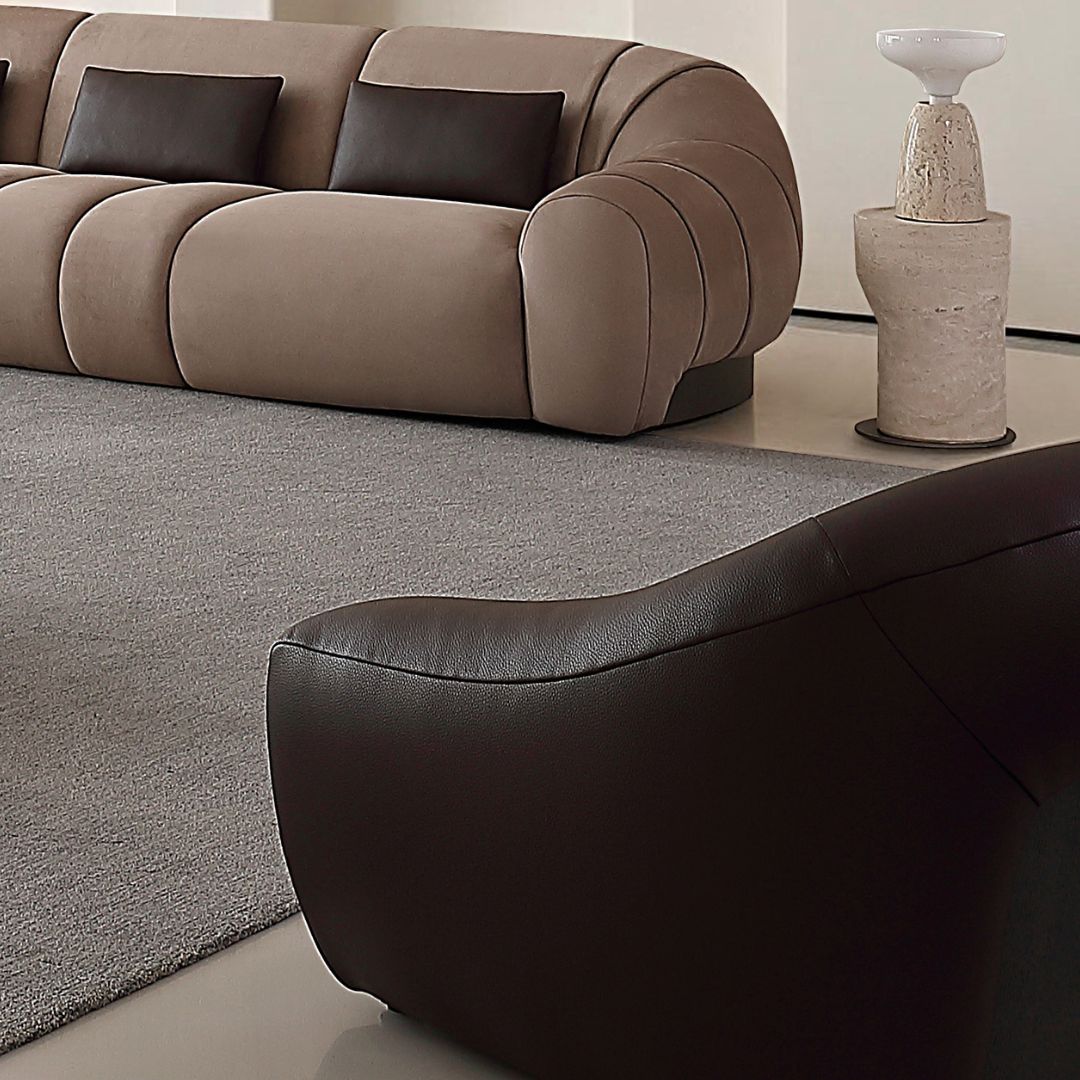 Modern Blob Armchair by BEACON with soft fabric upholstery and unique rounded design, perfect for contemporary living spaces.