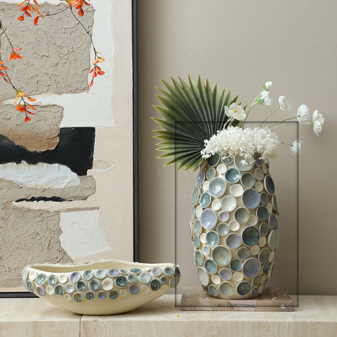 Colorful round glazed handmade ceramic vase by BEACON, featuring vibrant swirls and a smooth finish.