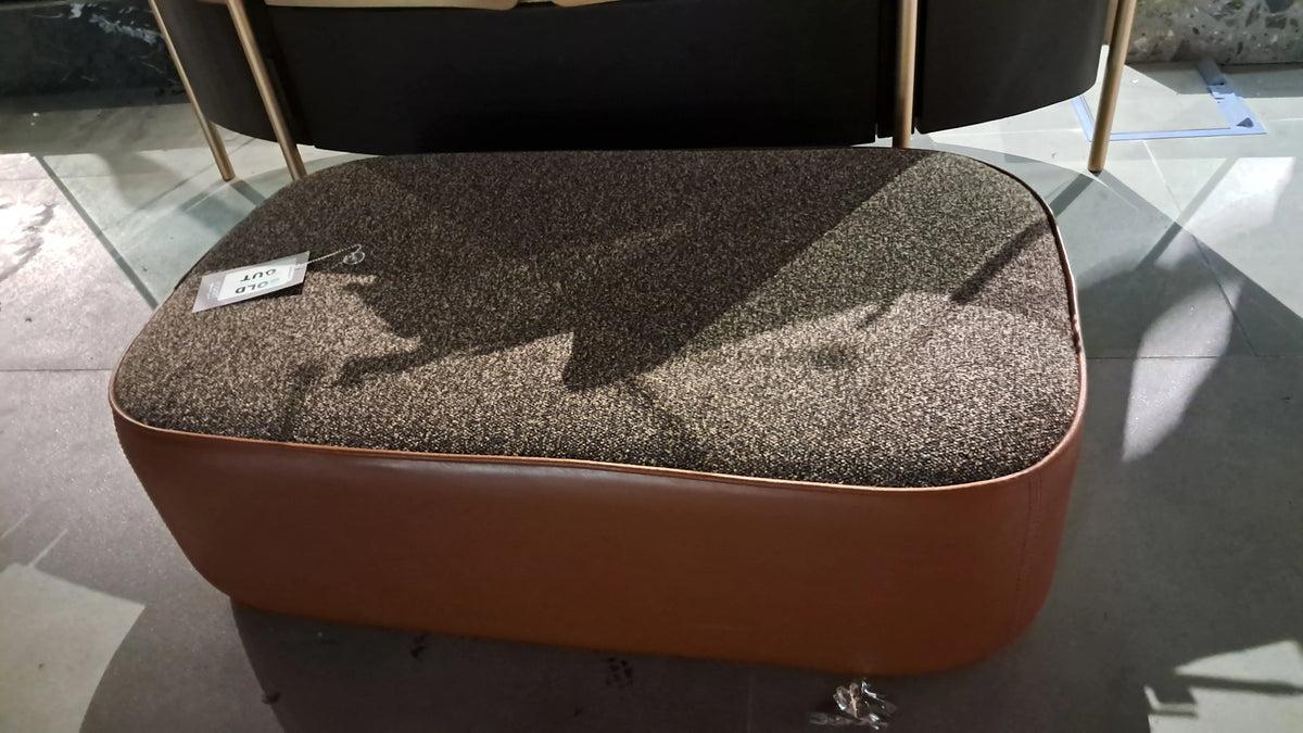 Display of Joker rectangle brown side pouf by TOGO HOME STYLE, showing its brown upholstered fabric and rectangular shape.