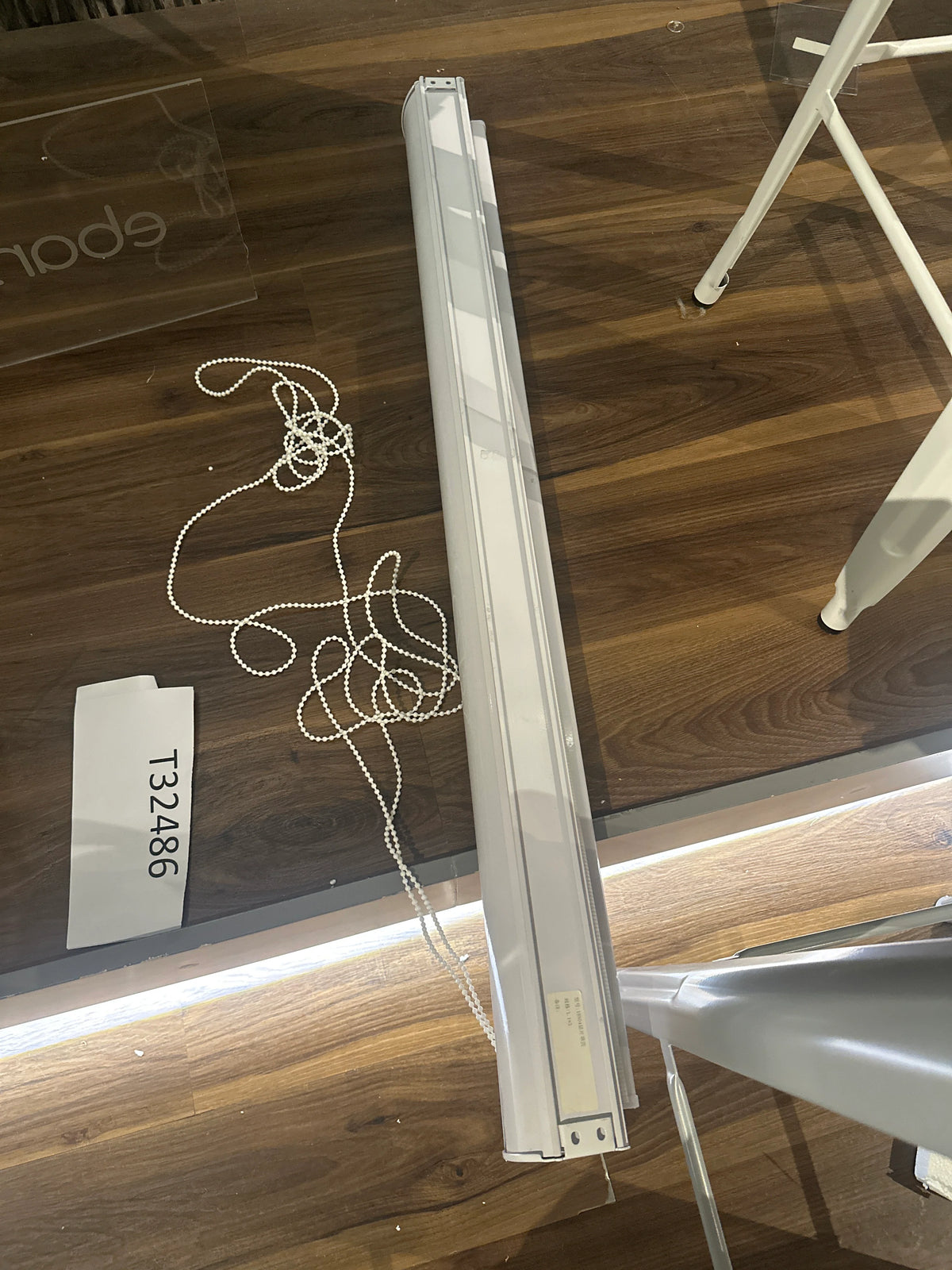 Display of small black Zebra blinds by Beacon, measuring 110cm wide, showing layered fabric and modern window covering style.