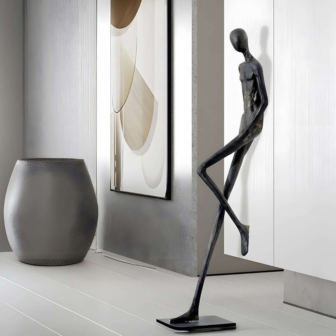 Fiberglass sculpture titled "Stride Of Confidence" by BEACON, showcasing a dynamic human figure in a modern artistic style.