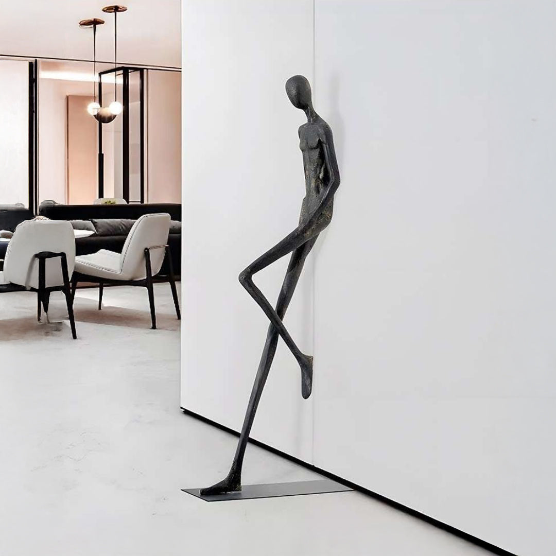 Fiberglass sculpture titled "Stride Of Confidence" by BEACON, featuring a dynamic human figure in a confident pose.