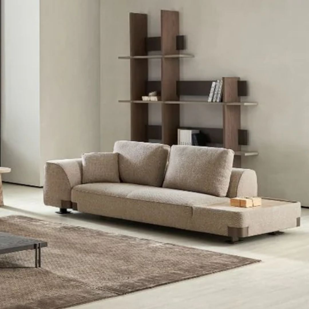 Forma 3-seater sofa with left arm and side table by BEACON, featuring plush cushions and modern design in a spacious living room scene.