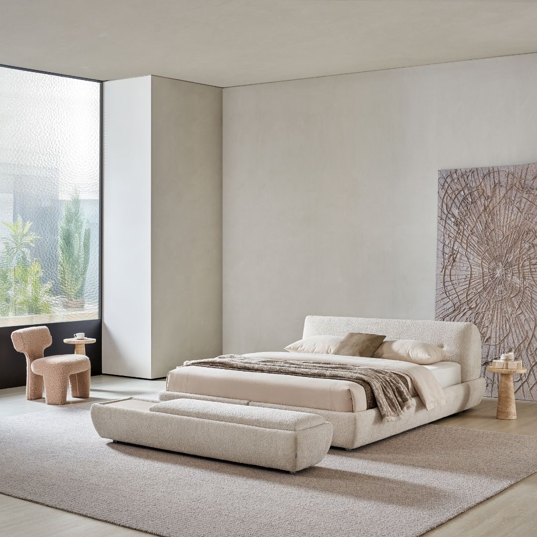 King size bedstead from Beacon, featuring a sturdy wooden frame and elegant design, shown in natural wood finish.