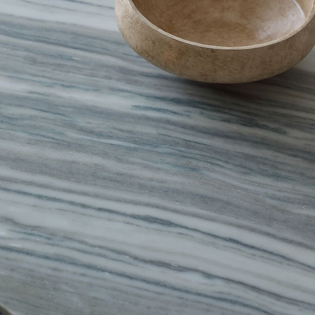 Manoor marble coffee table by BEACON, with a sleek rectangular surface and modern design, perfect for living room decor.