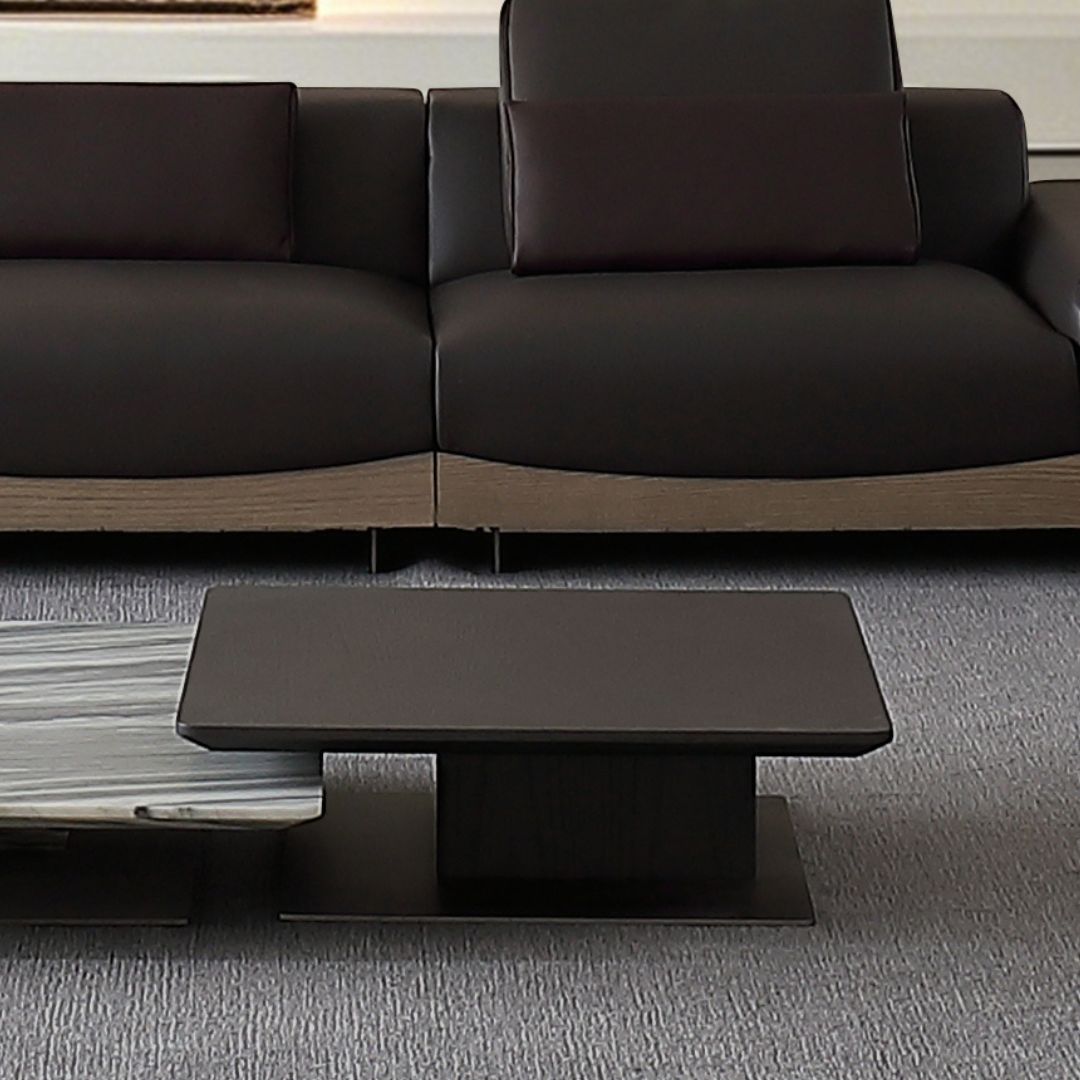 BEACON Manoor coffee table side table with a sleek wooden surface and modern design, shown in a contemporary living room setting.
