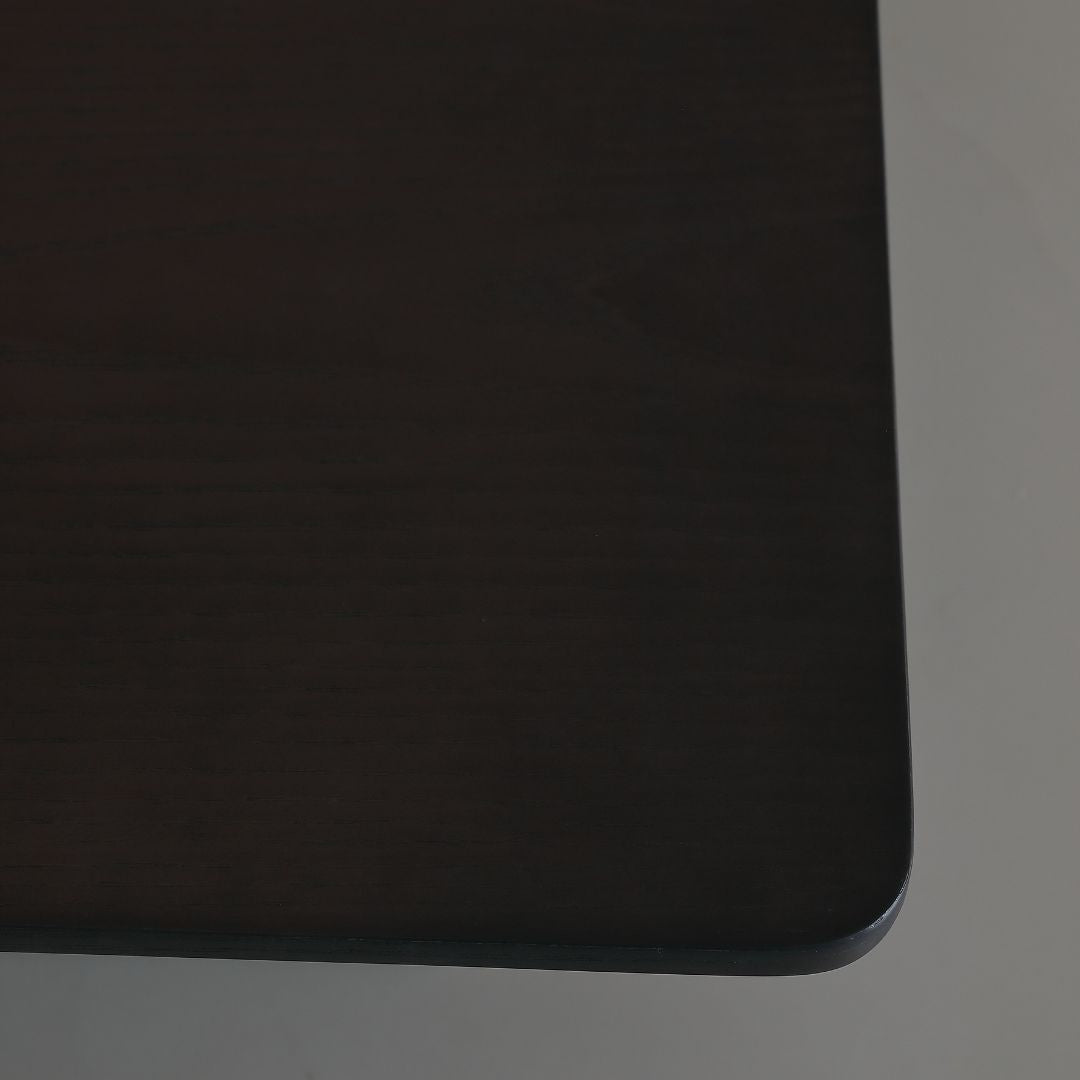 Modern Manoor coffee table by BEACON, featuring a sleek side table design with a smooth wooden surface and sturdy legs.
