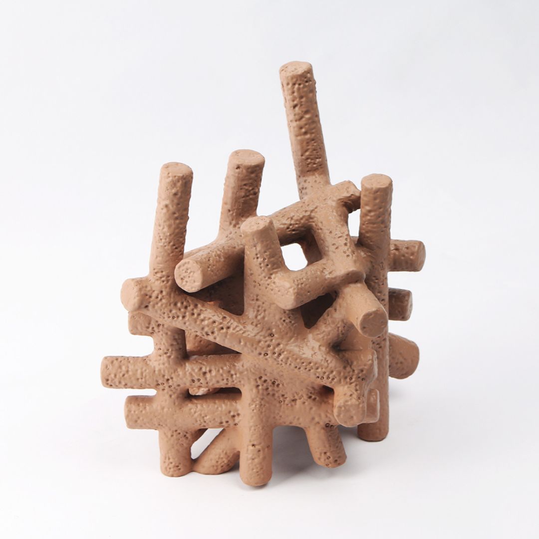 Muddy Red interlocking forms home decor figurines by BEACON, featuring abstract, textured design for modern interior decoration.