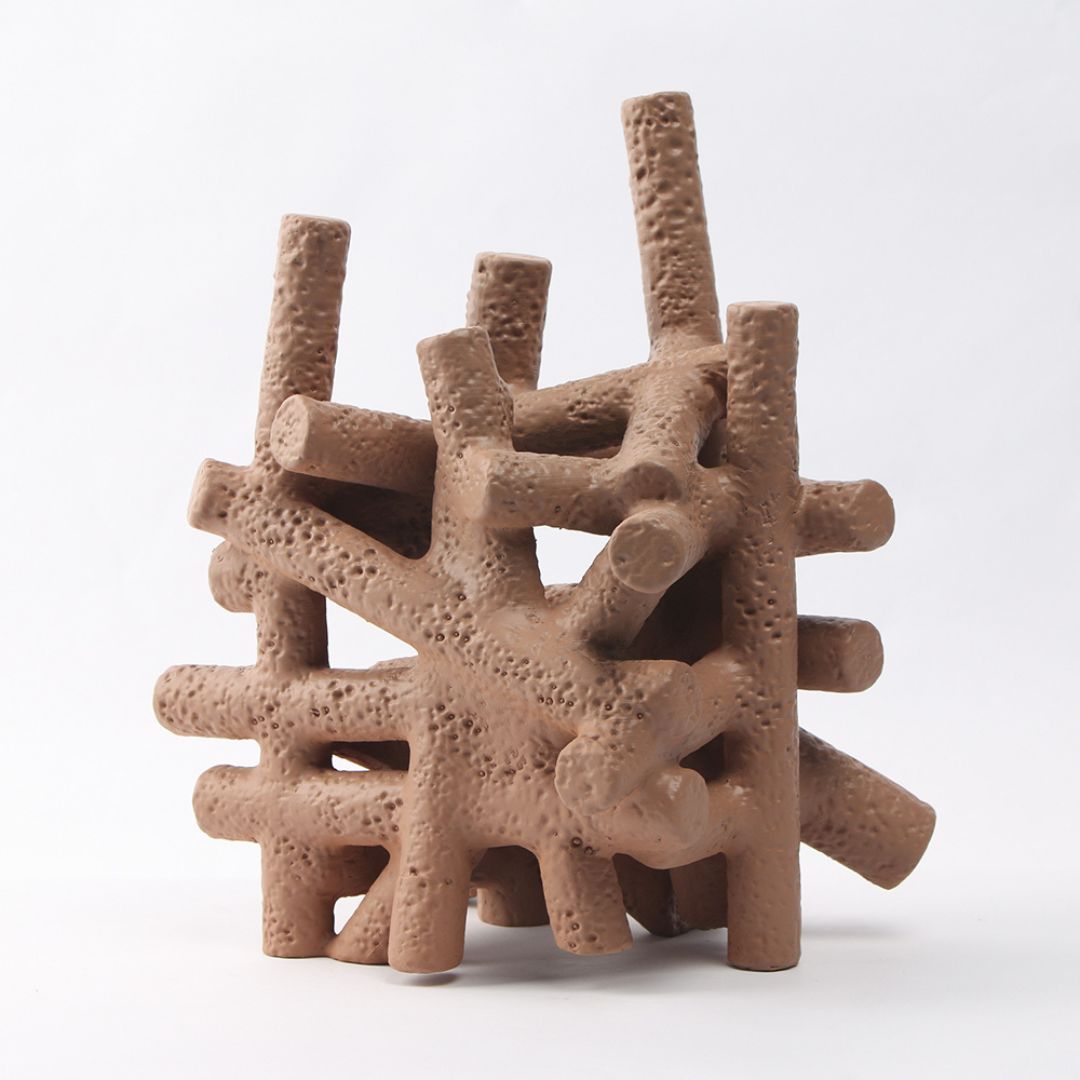 Muddy red interlocking forms decorative figurines by BEACON, home decor sculpture with a modern, abstract design.