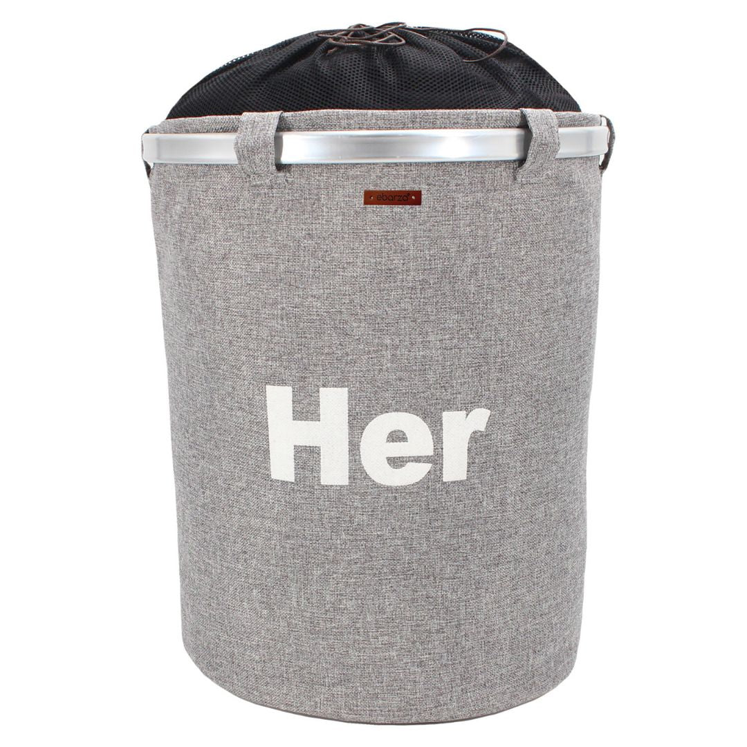 BEACON laundry storage basket in round Terra (Her) design, made of durable material, with a natural finish and sturdy handles.