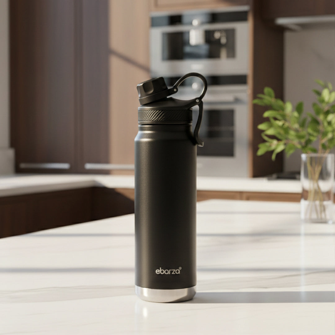 Black 709ml BEACON drinkware bottle with sleek design, ideal for beverages and daily use.