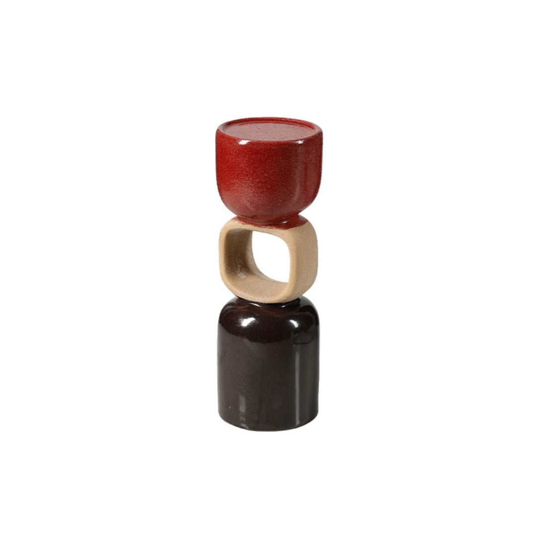 Ceramic ring-shaped candle holder in neutral tones, designed by BEACON, perfect for decorative candle displays.