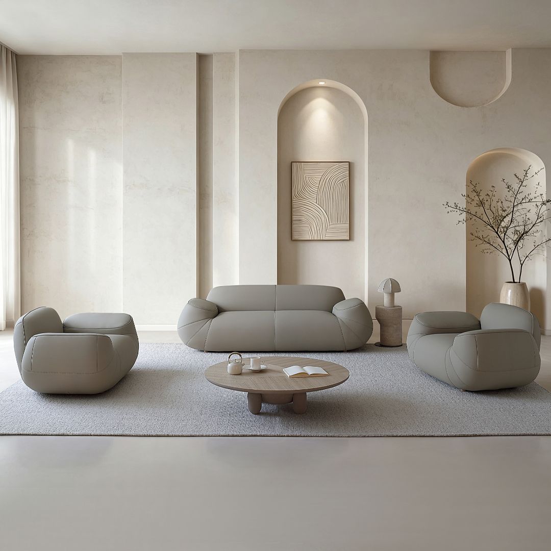 BEACON Rotunda armchair AMCJ-S6102 with plush fabric, modern design, and cushioned armrests displayed in a well-lit living room setting.