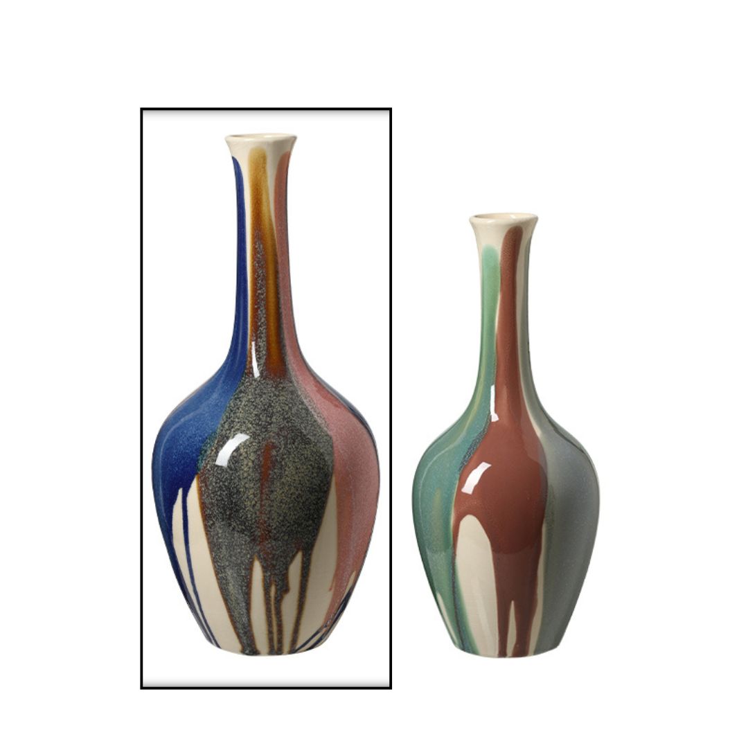 Splashed glaze slender ceramic vase by BEACON with a sleek, elongated shape and artistic splash design in vibrant colors.