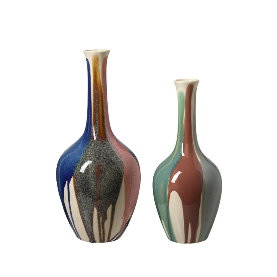 Splashed glaze slender ceramic vase by BEACON, with a sleek, elongated design and artistic splash pattern, perfect for modern decor.