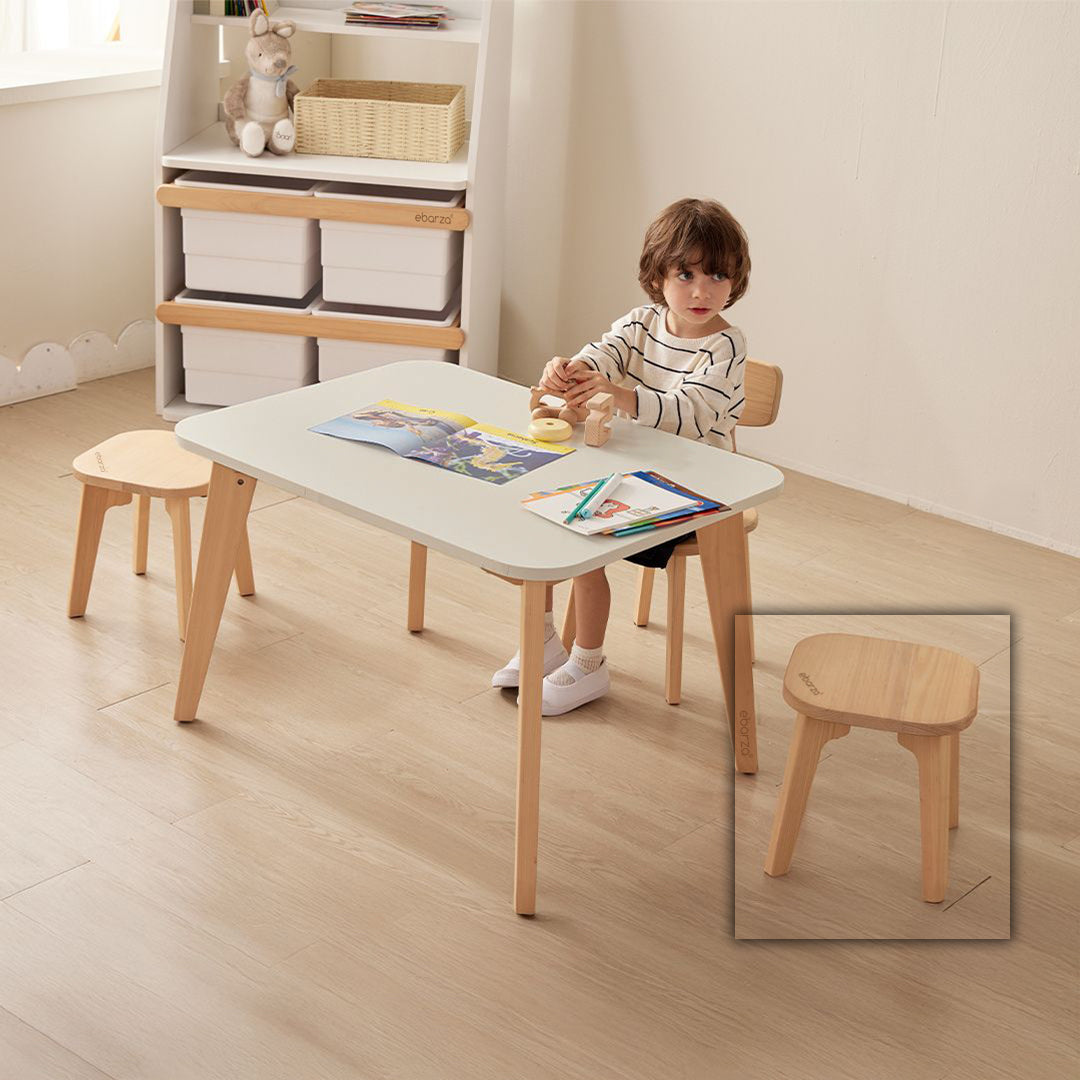Bright colorful Tidy Kid low stool from BOORI, designed for children, with a sturdy wooden structure and playful finish.