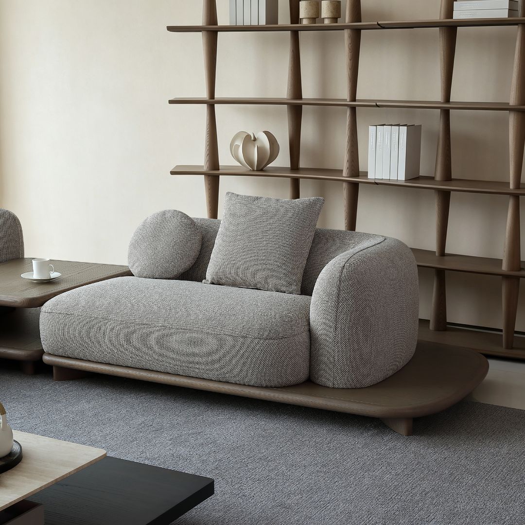 BEACON Umbra sofa with side table, modern design, featuring a comfortable upholstered seat and sleek side table.