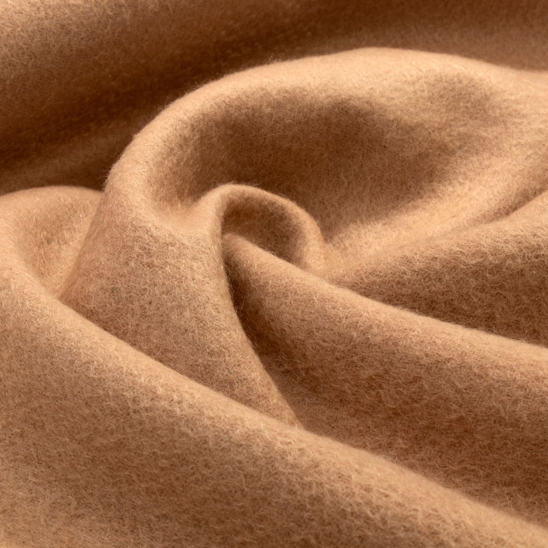 Beige Lana Wool Scarf by BEACON, soft and cozy wool blanket with fringed edges, perfect for warmth and style.