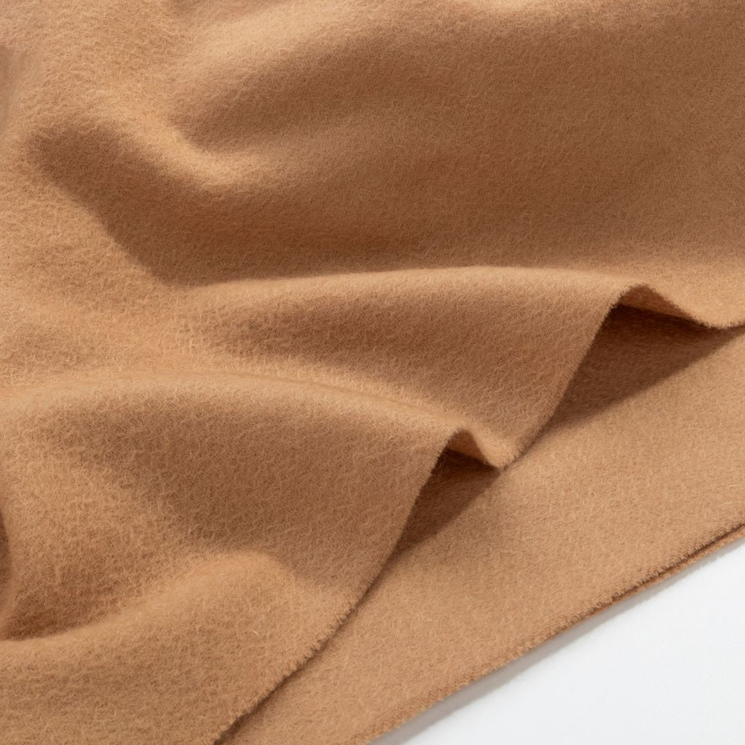 BEACON Lana Wool Scarf DR-SC004 in soft, warm wool, draped over a neutral background, showcasing its cozy texture and stylish design.