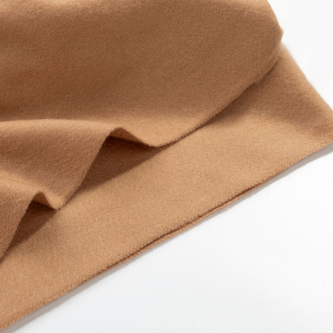 BEACON Lana Wool Scarf DR-SC004, soft wool blanket with fringed edges, in neutral tones, showcasing cozy, lightweight textile.