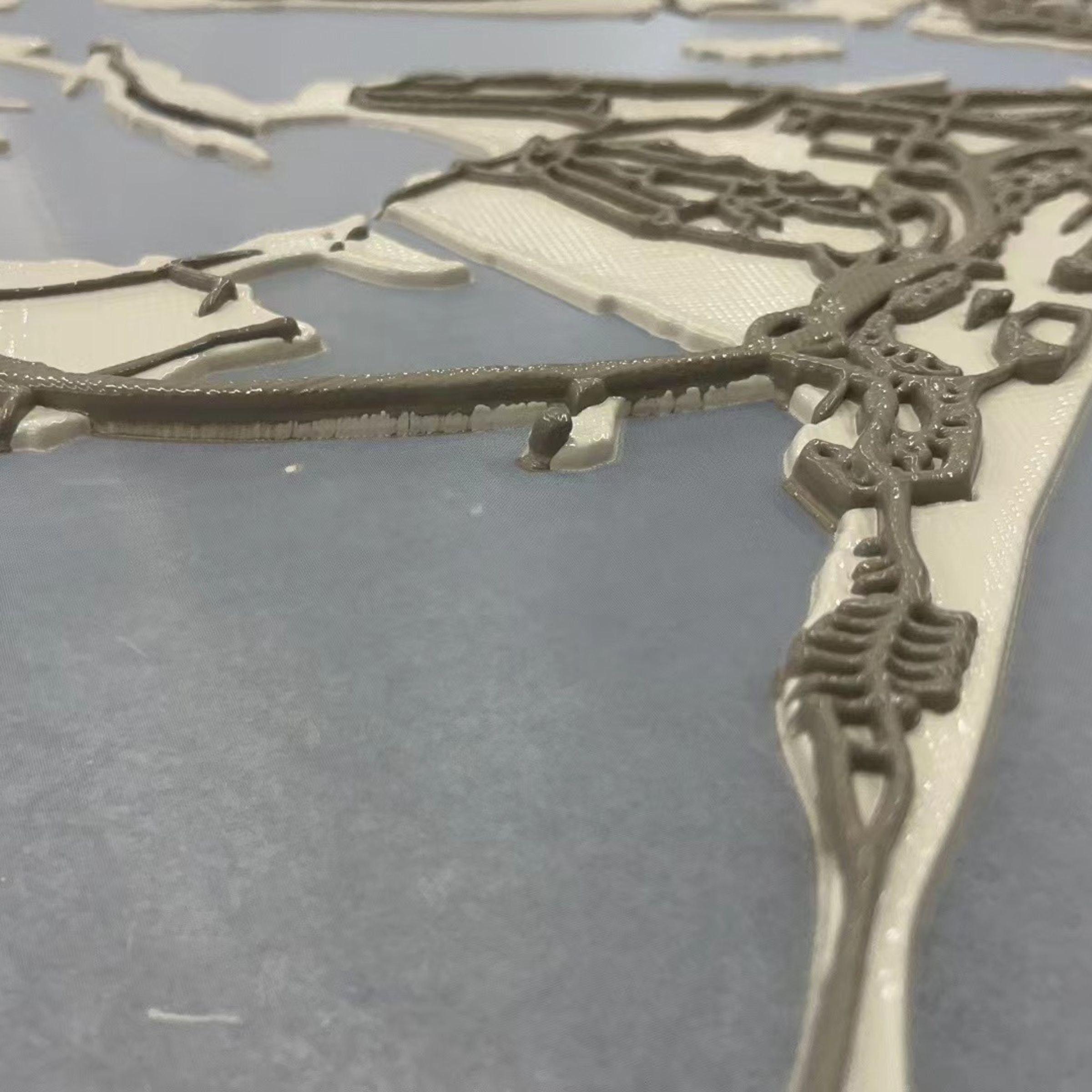 Handmade Abu Dhabi map painting in 140x140 cm with detailed city layout, created by BEACON brand.