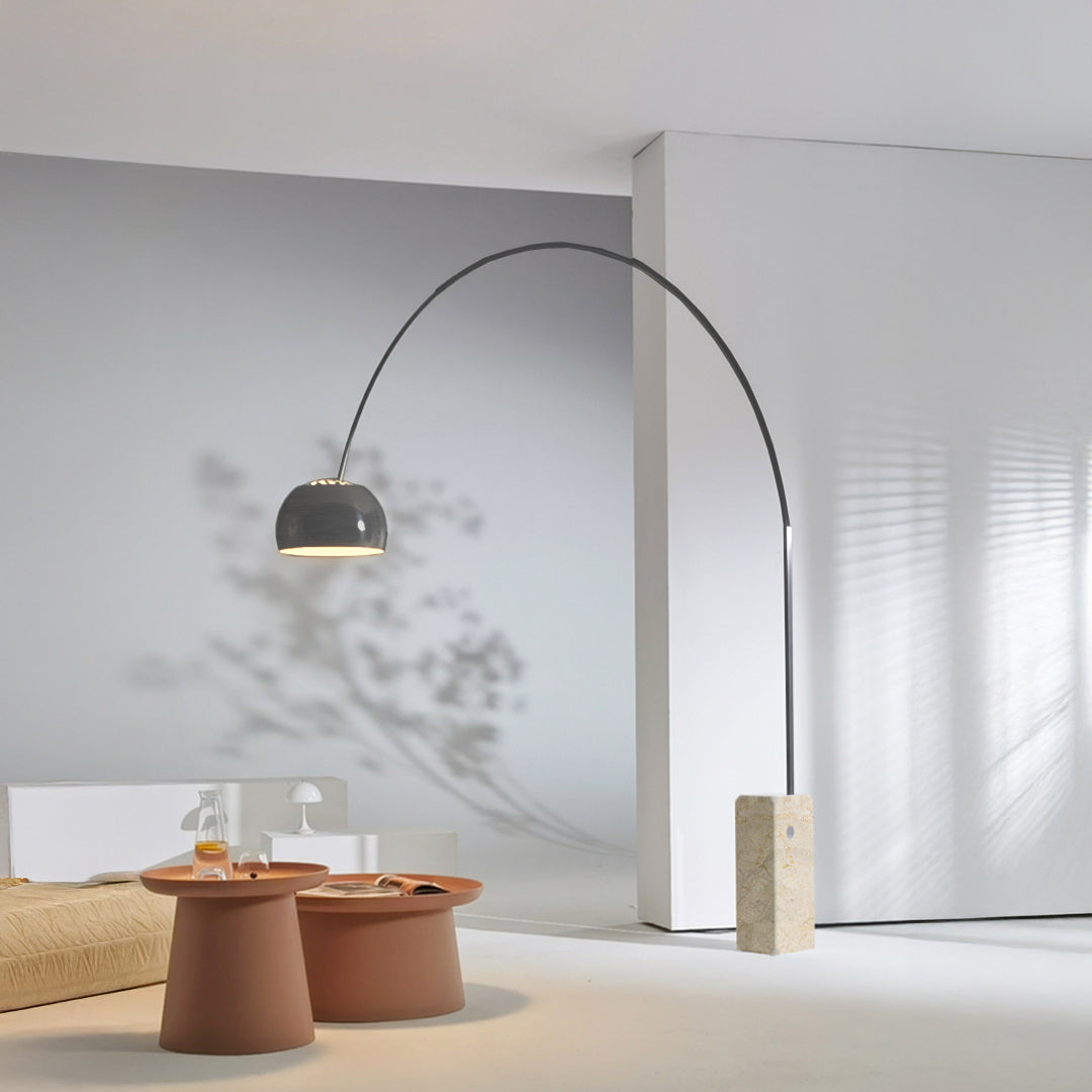 BEACON 75-day pre-order arc floor lamp with travertine base, modern design, sleek metal arm, and elegant stone finish.