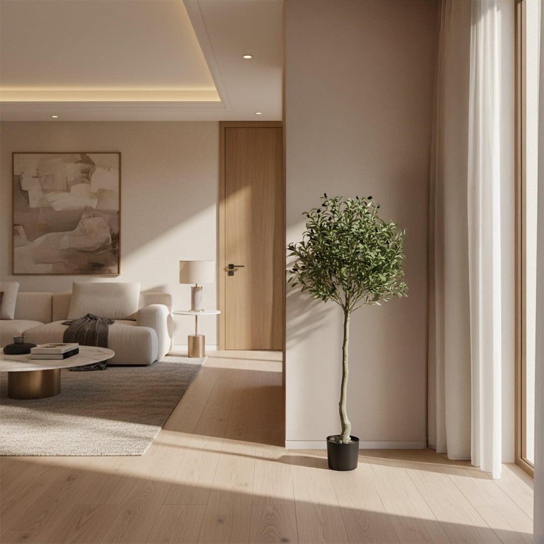 Artificial olive tree from BEACON, featuring realistic green leaves and a sturdy trunk, ideal for indoor or outdoor decor.