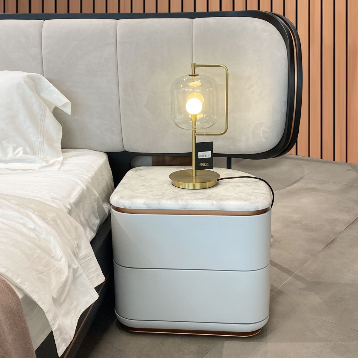 Two LODA Furniture Tulip bedside tables, display item, showcasing sleek white design with rounded tulip-style bases.