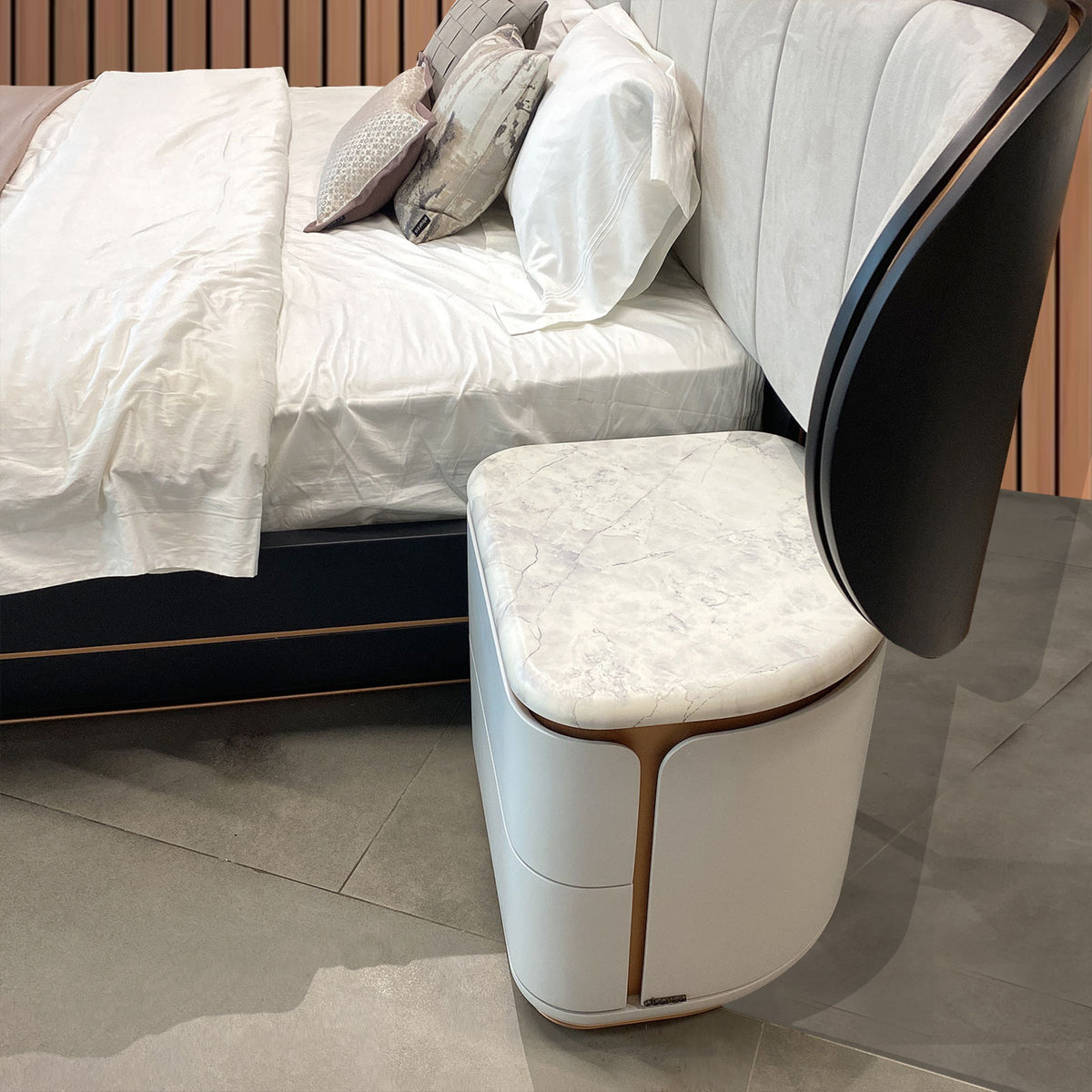 Two LODA Furniture Tulip bedside tables in display condition, featuring sleek tulip-shaped design and natural wood finish.