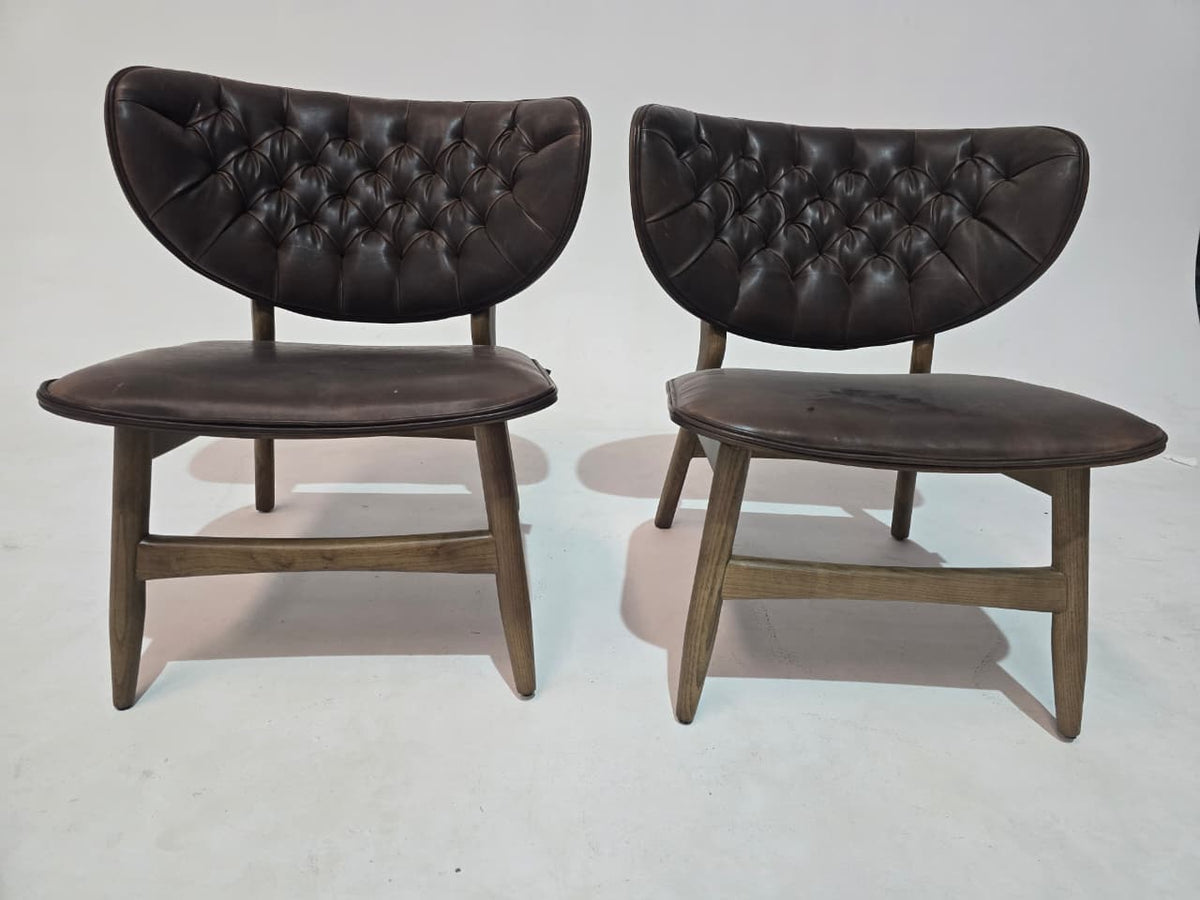 AS IS Flora Lounge Chair by Ozzo in vintage brown leather, showing the display item with a stylish, upholstered design.
