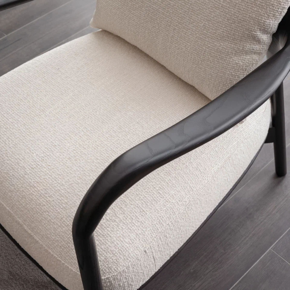 AS IS Grande Wooden Lounge Chair G9 display item by ORIX, with a sturdy wooden frame and cushioned seat.