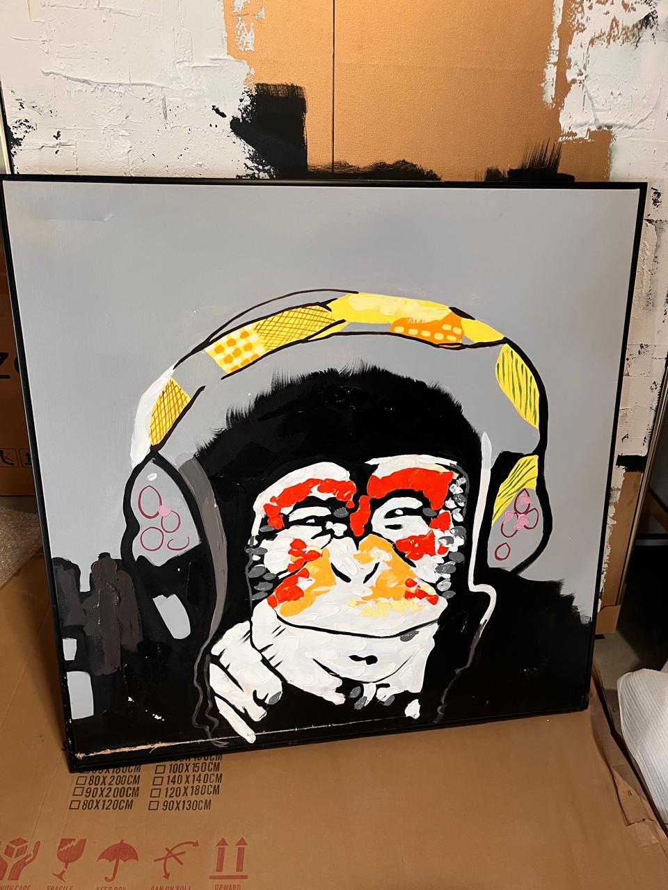 Relaxed monkey hand-painted art painting with frame, 105x105 cm, displayed as a decorative wall art piece by BEACON.