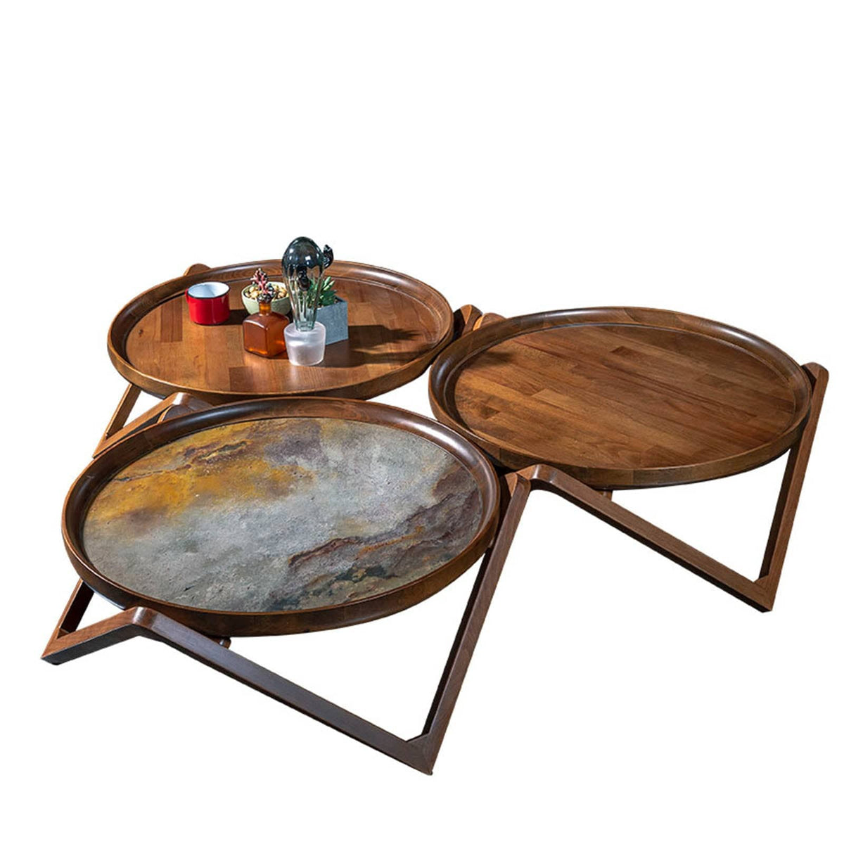 Set of three passion center tables from TOGO HOME STYLE, display item with modern round tabletops and sleek bases.