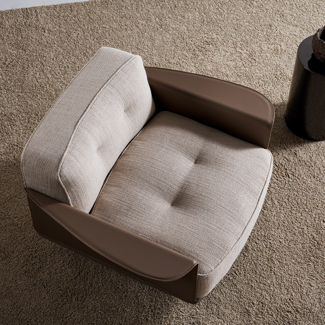 Display Avenor armchair by Beacon, featuring plush upholstery and modern design, shown as a display item in a showroom setting.